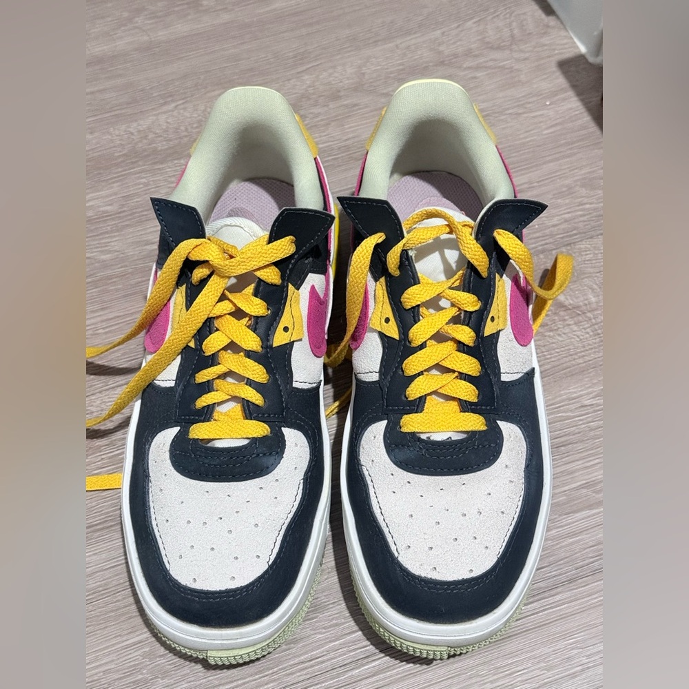 Nike Women's Sneakers with Yellow and Pink Accents